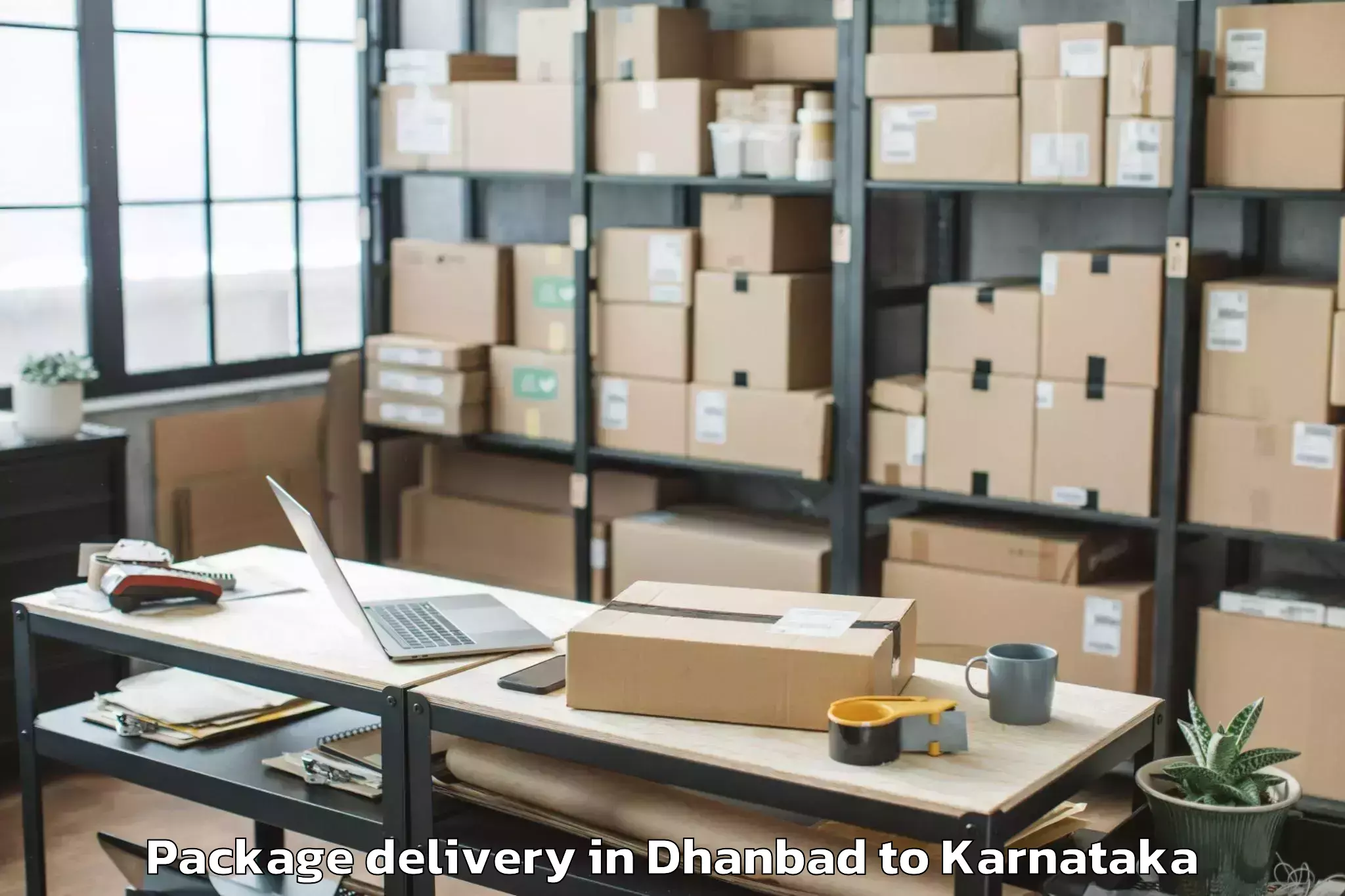 Easy Dhanbad to Arkalgud Package Delivery Booking